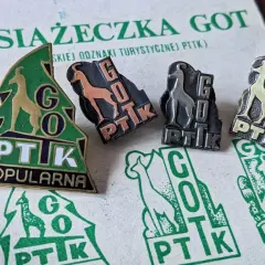 Książeczka GOT z odznakami turystycznymi PTTK. Odznaki przedstawiają kozice i napis GOT PTTK.
