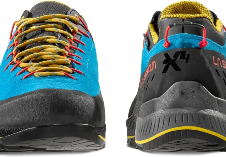 Buty La Sportiva TX4 Evo w kolorze niebieskim z żółtymi sznurówkami i czerwonymi akcentami. Idealne na górskie wędrówki.