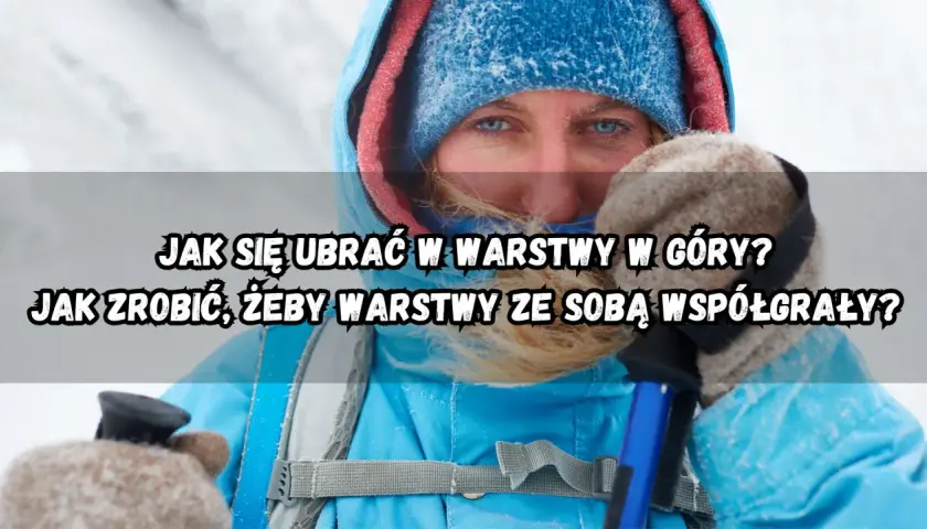 Kobieta w zimowej kurtce i czapce, gotowa na wędrówkę. Dowiedz się, jak się ubrać w góry, by warstwy odzieży działały razem.