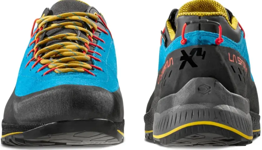 Buty La Sportiva TX4 Evo w kolorze niebieskim z żółtymi sznurówkami i czerwonymi akcentami. Idealne na górskie wędrówki.