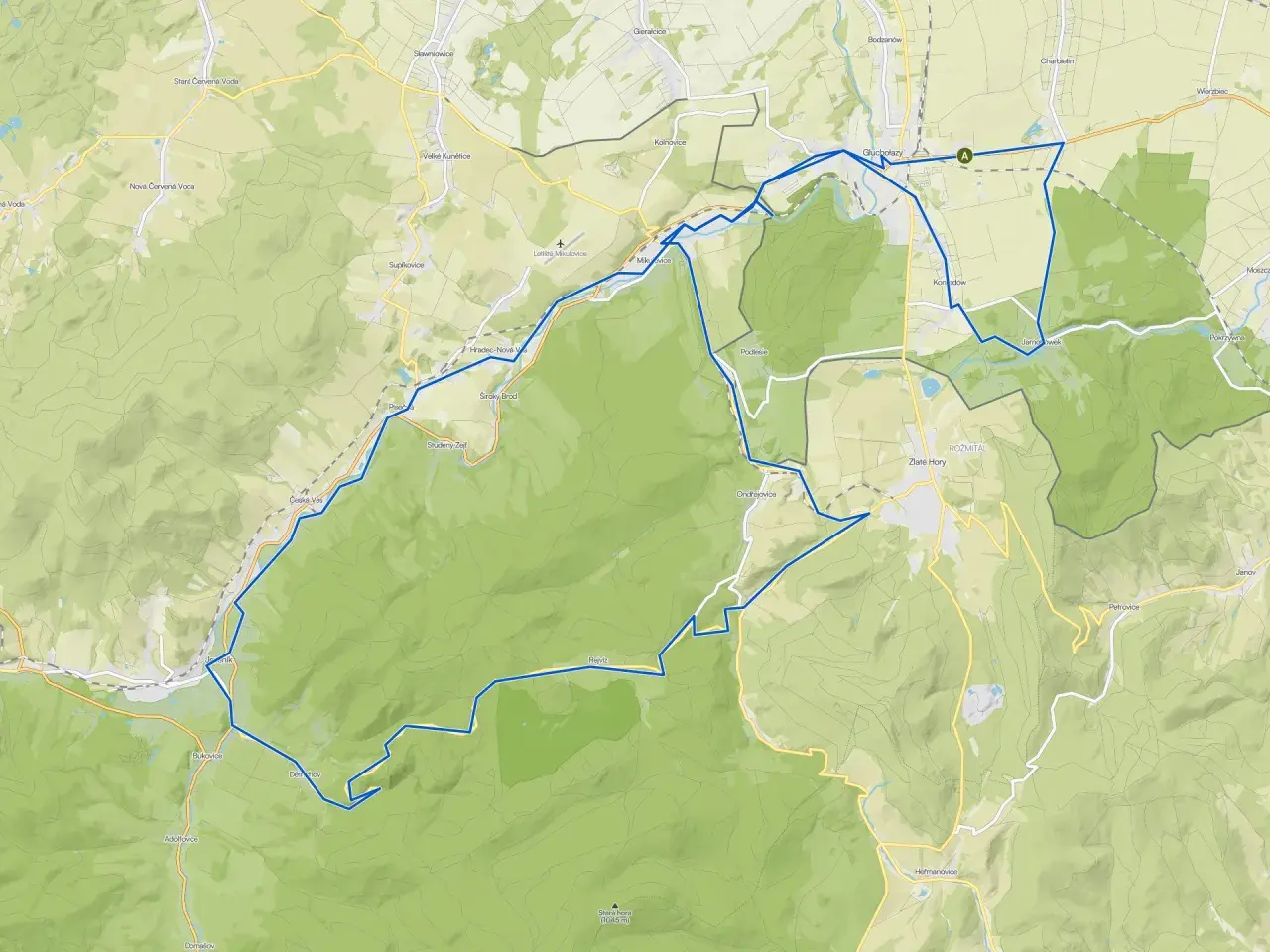 Mapa turystyczna z zaznaczoną trasą wokół Głuchołaz. Atrakcje przyrodnicze i miejscowości na trasie.